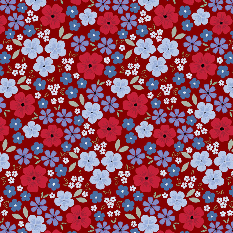 fabric pattern of red and blue flowers scattered all over a red background