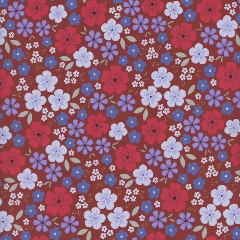 fabric pattern of red, blue, and purple flowers scattered on a dark red background