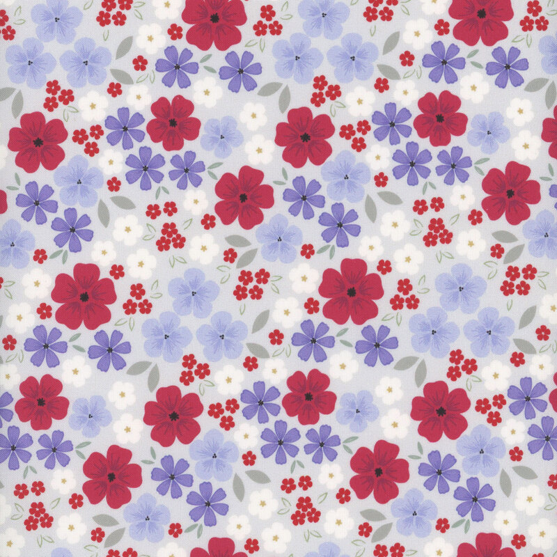 fabric pattern of red, white, and blue flowers scattered on a light gray background
