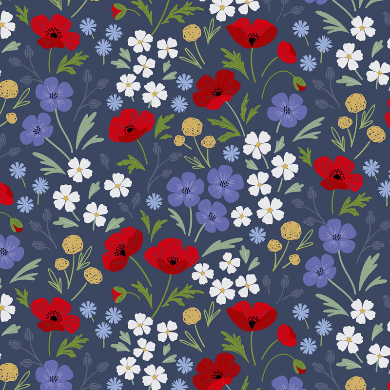 fabric of different flowers all over a dark blue background