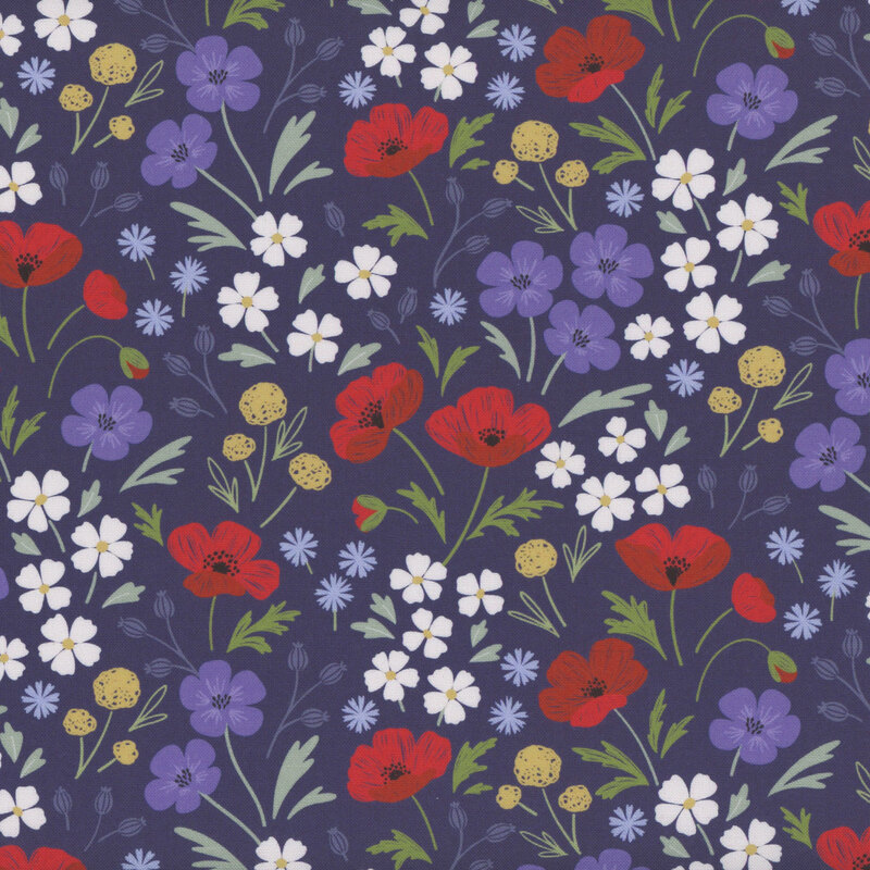 fabric of different flowers in blue, red, yellow, and white scattered on a dark blue background