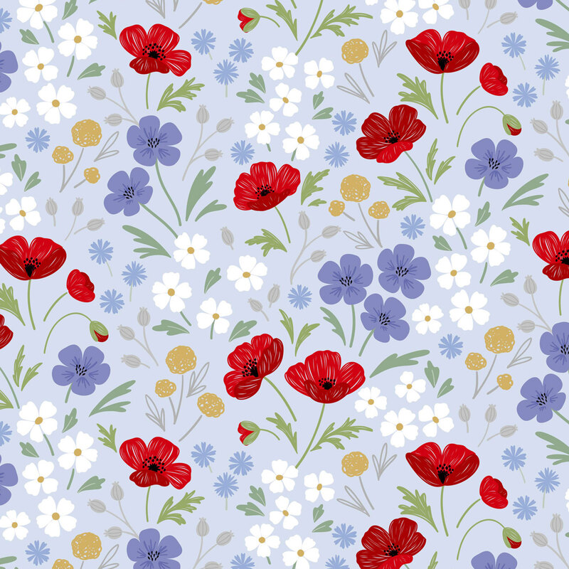 fabric of different flowers all over a pale blue background