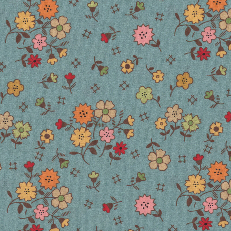 Dark aqua fabric with clusters of flowers and symbols tossed across the design.