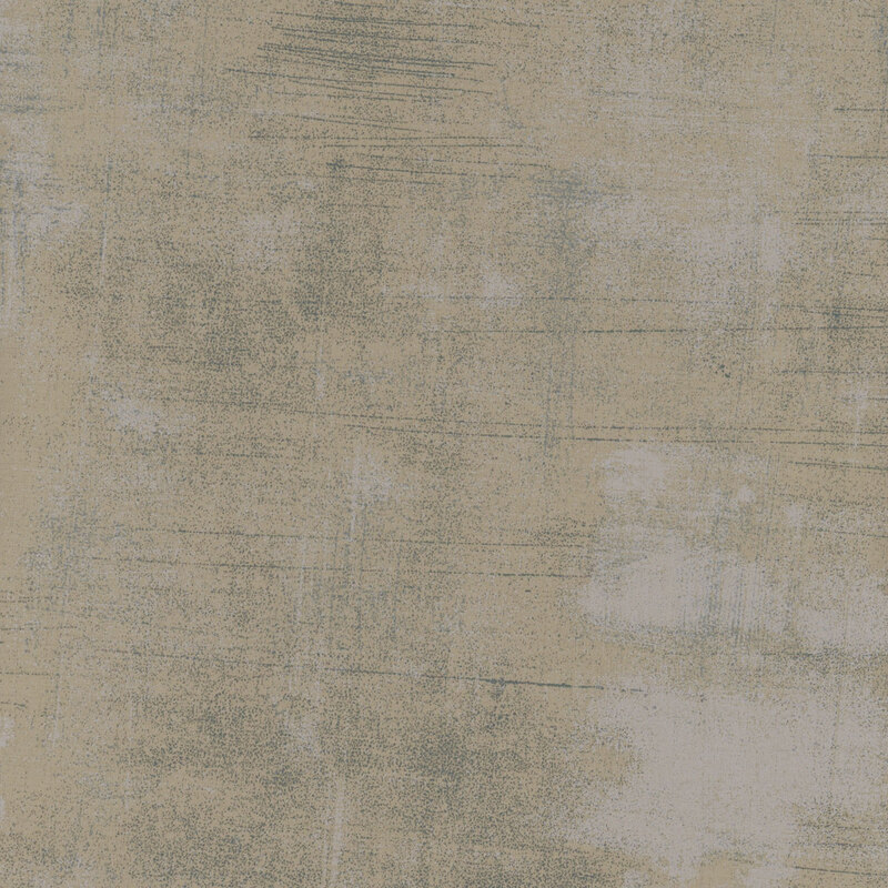 grey mottled and textured fabric