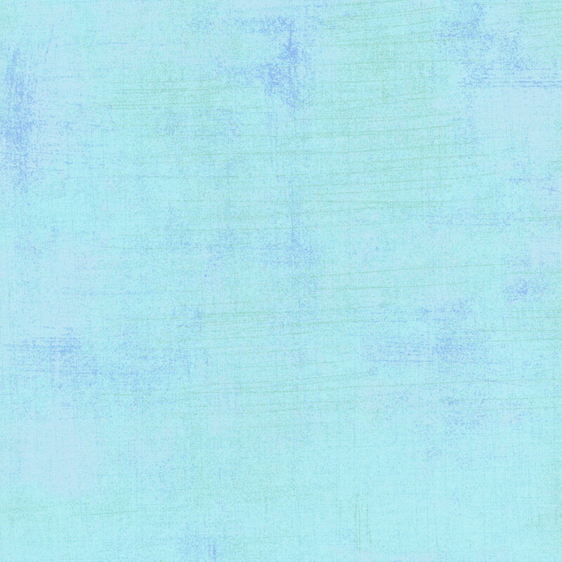 light blue mottled and textured fabric