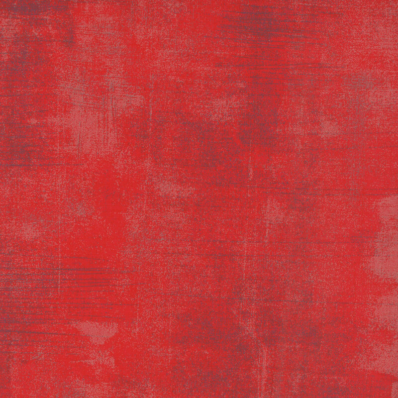 red mottled and textured fabric