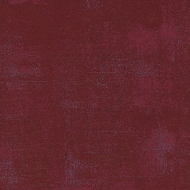 burgundy mottled and textured fabric