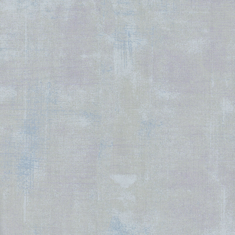 gray mottled and textured fabric