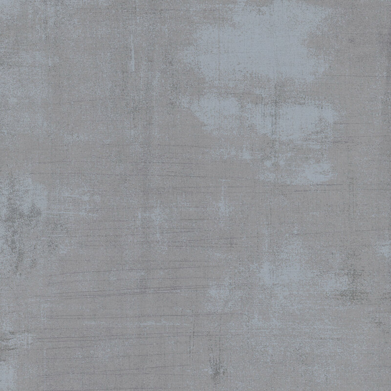 gray mottled and textured fabric