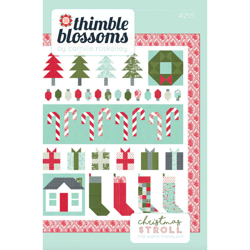 Colorful quilt pattern featuring Christmas trees, candy canes, gifts, and stockings on a pastel background.