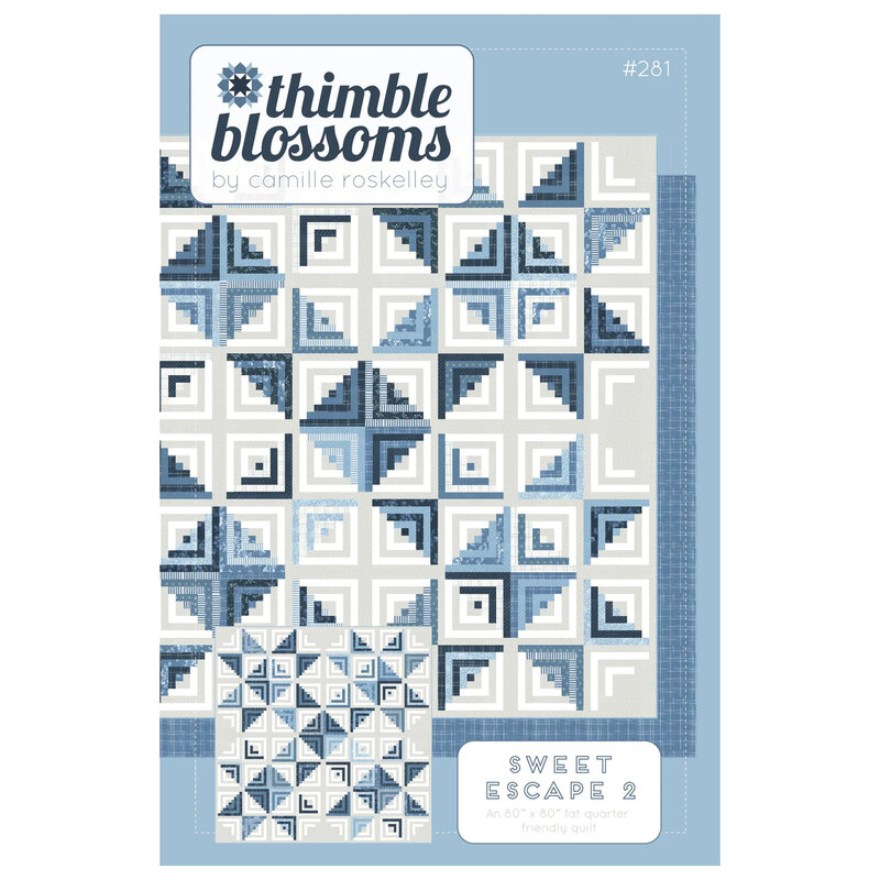 Quilt pattern cover featuring a blue and white log cabin design with a smaller geometric pattern below.
