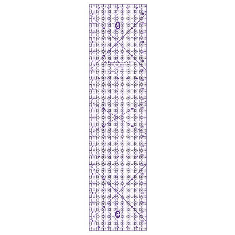 Clear acrylic ruler with measurement grids and diagonal lines for precise cutting and quilting.