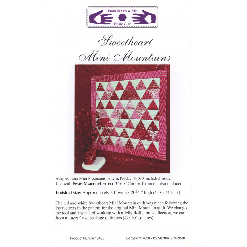 Front of the Sweetheart Mini Mountains pattern, featuring a colorful quilt with triangle designs.