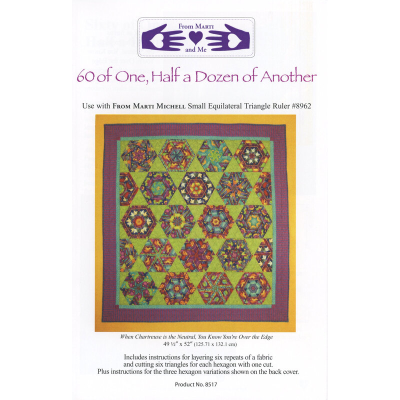 A colorful quilt pattern featuring hexagonal and star designs