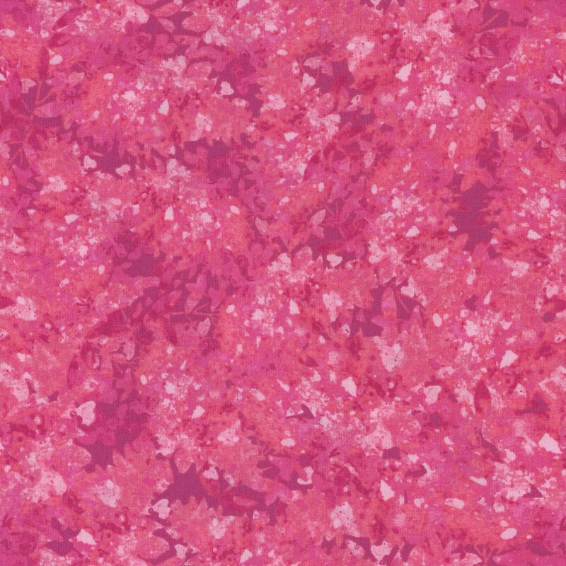 Pink fabric with a mottled and flecked design in different shades.