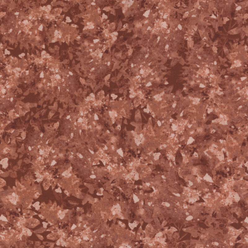 Brown fabric with a mottled and flecked design in different shades.