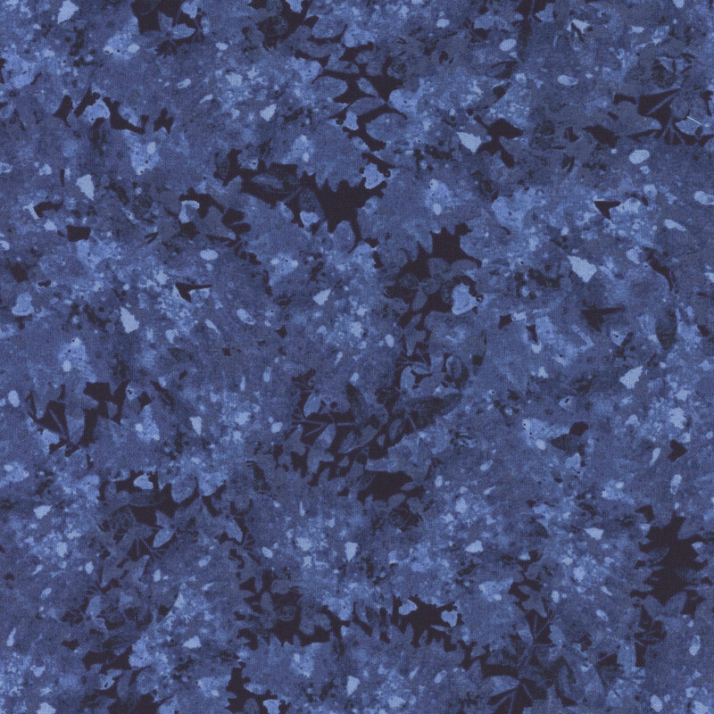 Navy blue fabric with a mottled and flecked design in different shades.