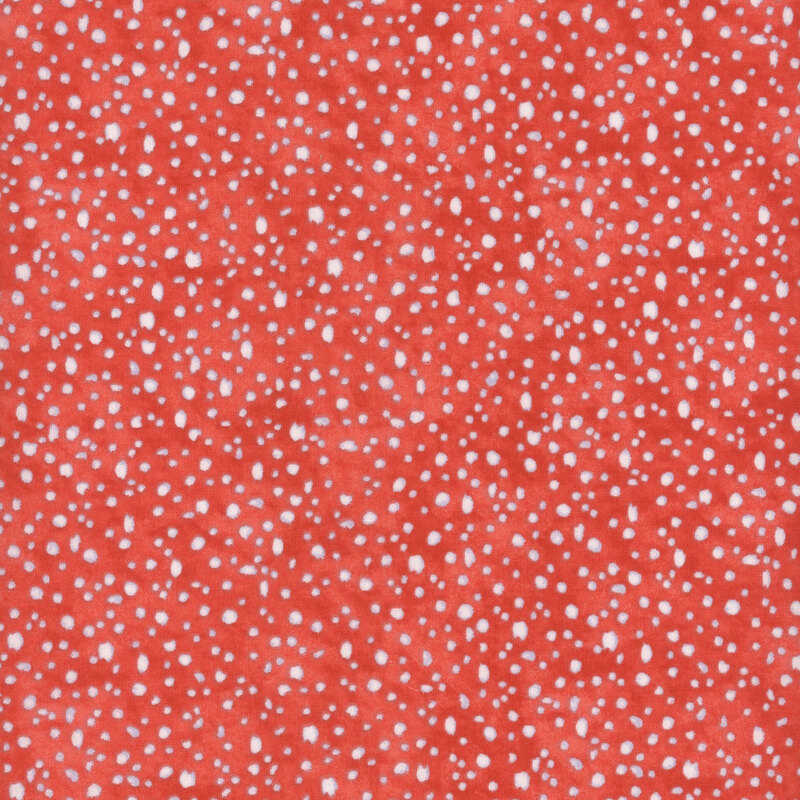 fabric pattern of white dots scattered all over a red marbled background