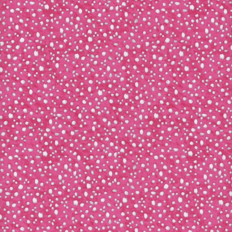 fabric pattern of white dots scattered all over a pink marbled background