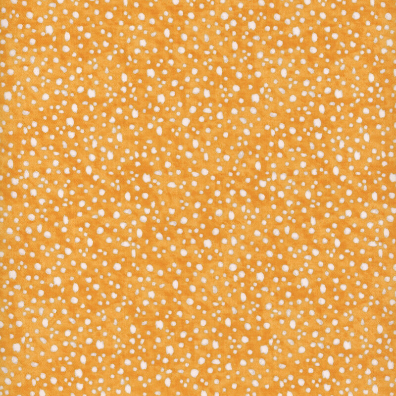 fabric pattern of white dots scattered all over a orange marbled background