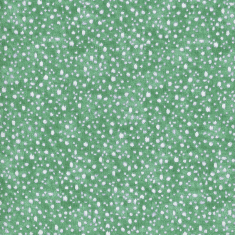 fabric pattern of white dots scattered all over a green marbled background