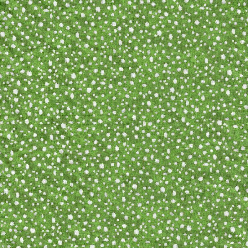 fabric pattern of white dots scattered all over a green marbled background