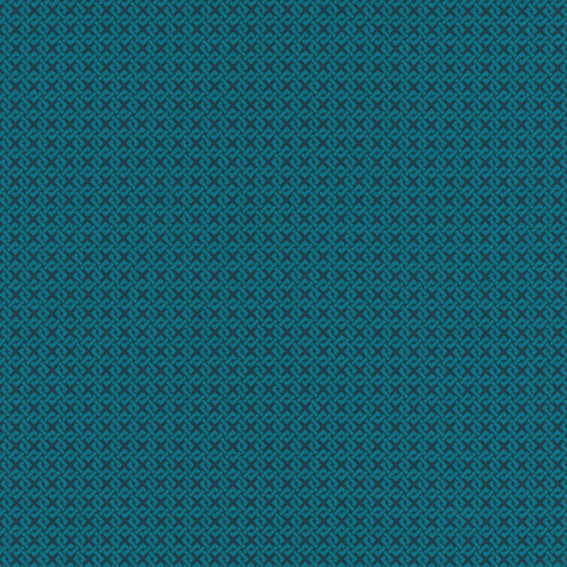 Turquoise fabric with an interlocking navy design.