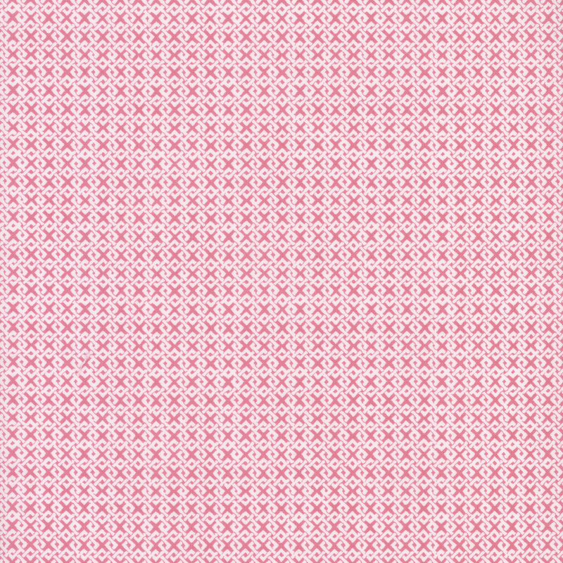 Pink fabric with an interlocking white design.