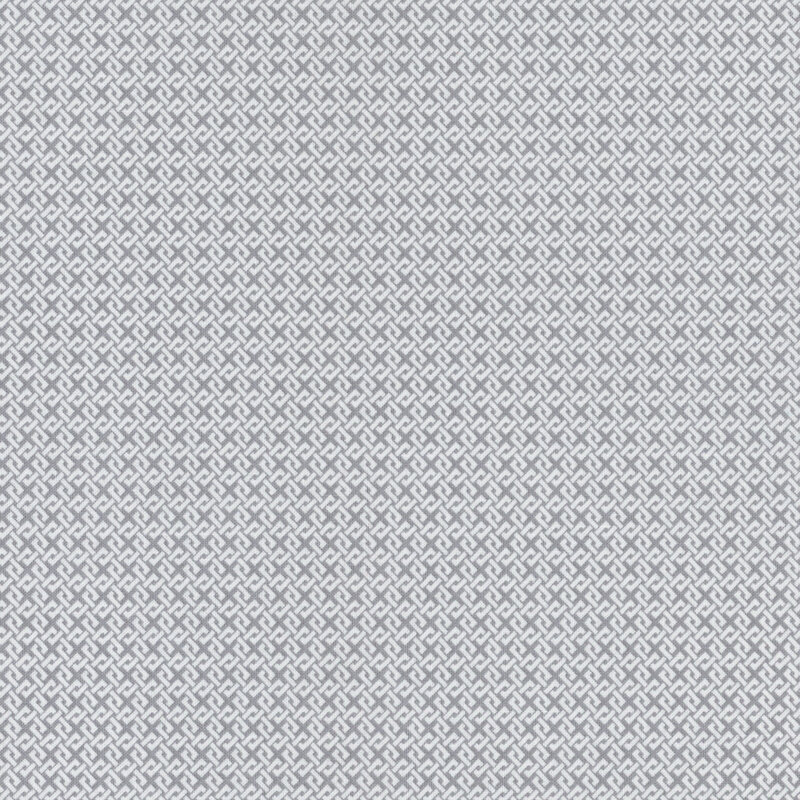 Gray fabric with an interlocking white design.