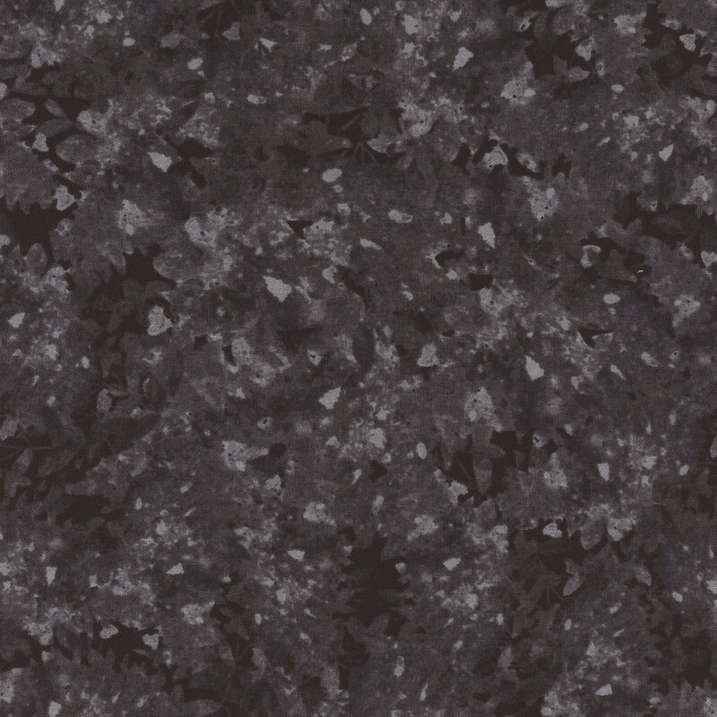 Black fabric with a mottled and flecked design in different shades.