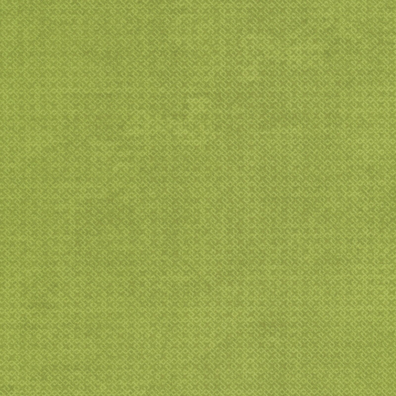 A textured fabric surface in a bright lime green color.