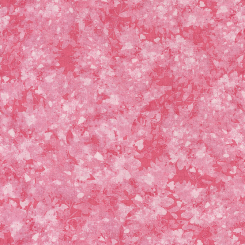 Light pink fabric with a mottled and flecked design in different shades.