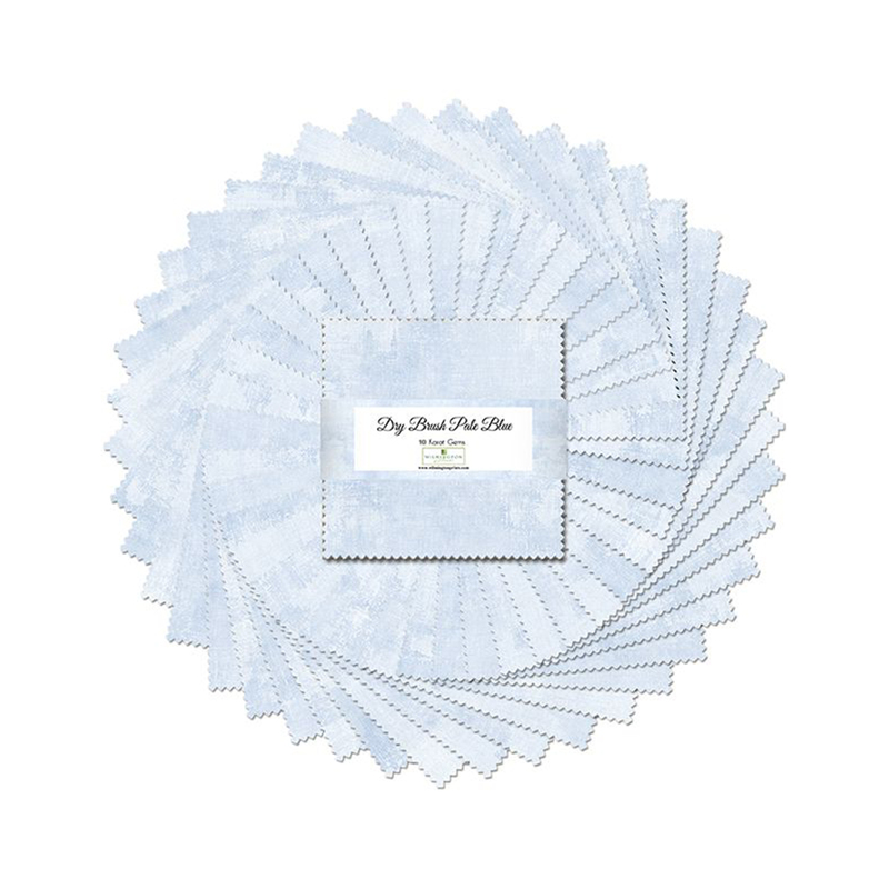 A circular arrangement of light blue fabric swatches with a square label in the center reading Dry Brush Pale Blue