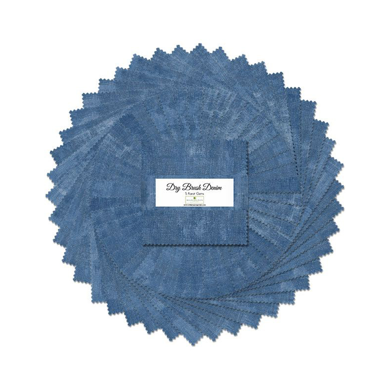 A fanned out collage of the blue fabrics included in the Dry Brush Denim 5 Karat Gems set.