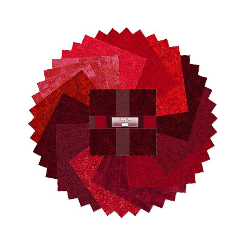 A fanned out collage of the red fabrics included in the Ruby Days 10 Karat Gems set.