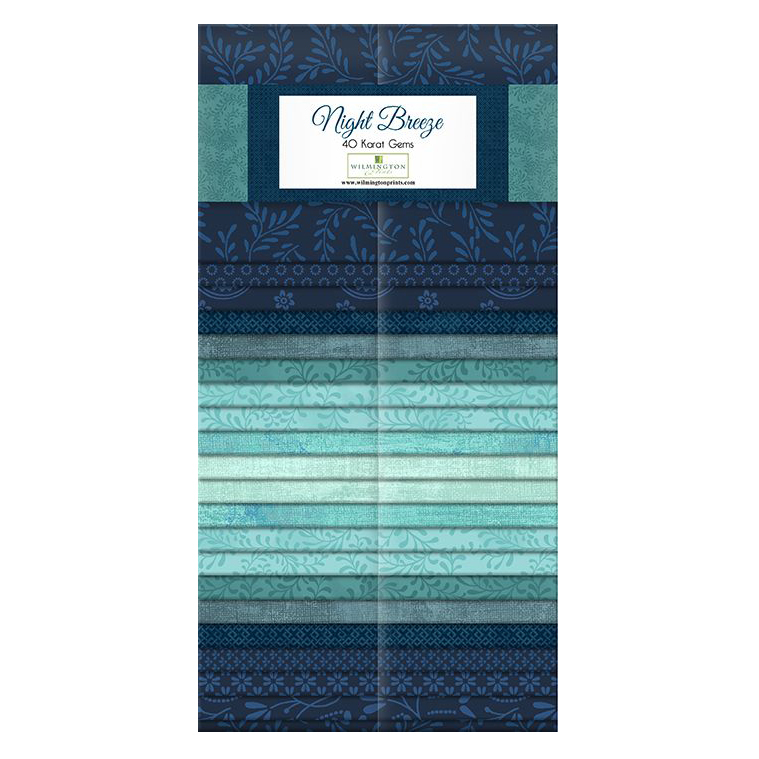 vertical fabric strips of navy and teal tonal floral patterns