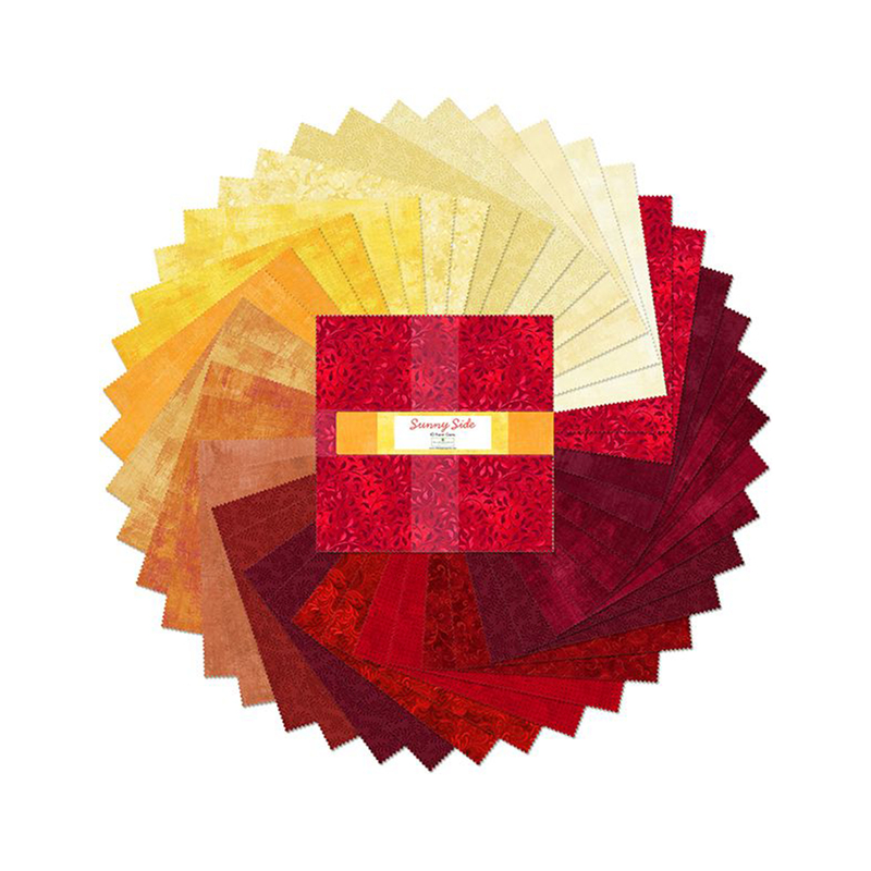 A circular arrangement of fabric swatches in warm colors surrounding a central square bundle with a label.