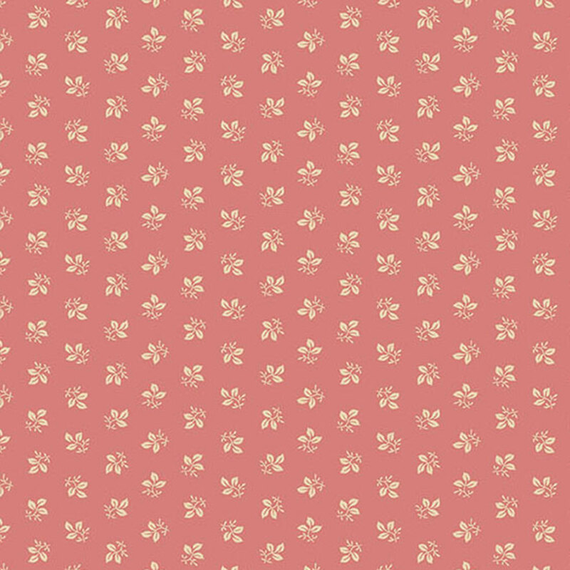 Pink fabric with rows of ditsy leaves.