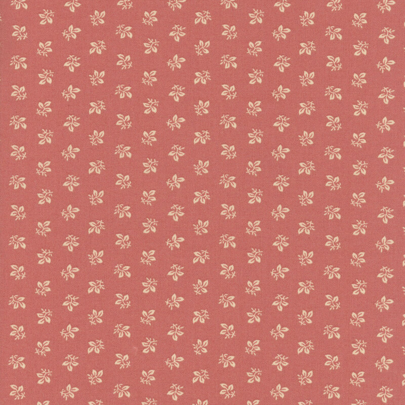 Pink fabric with rows of ditsy leaves.