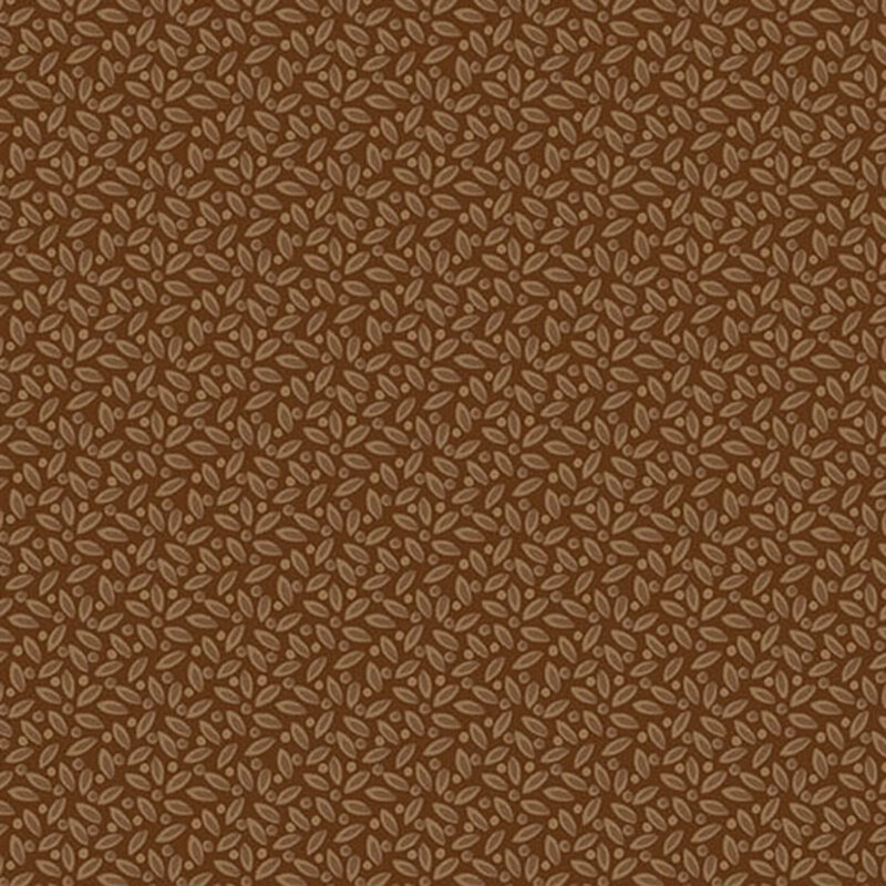 Brown fabric with a packed, tonal leafy design.