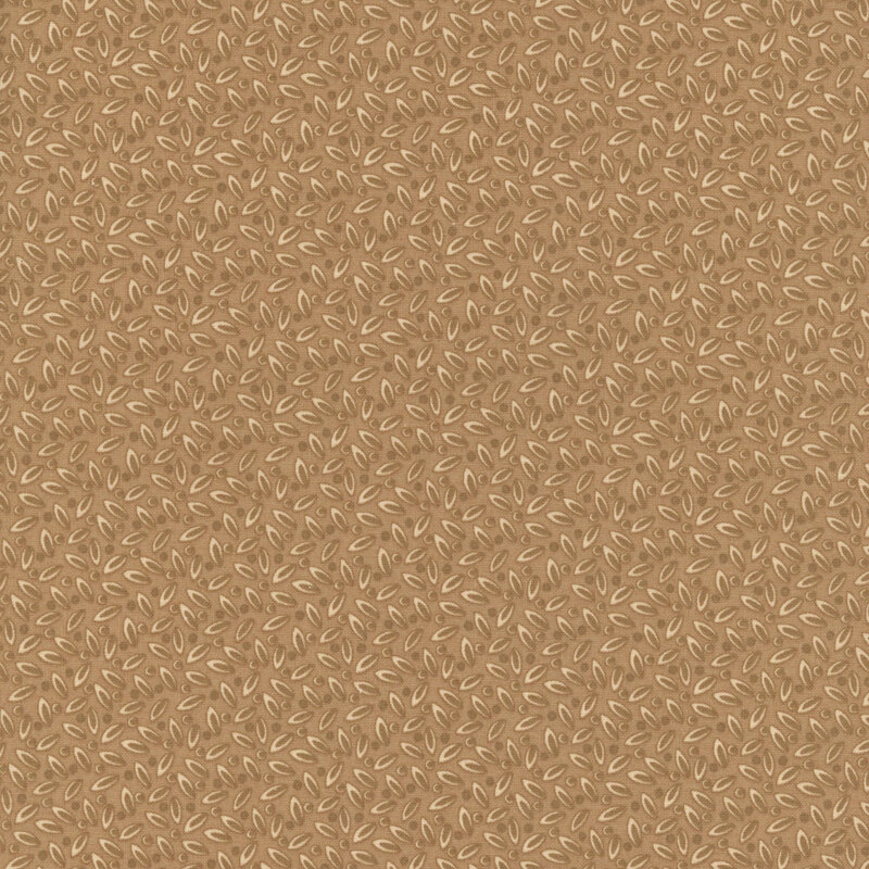 Tan fabric with a packed leafy design.