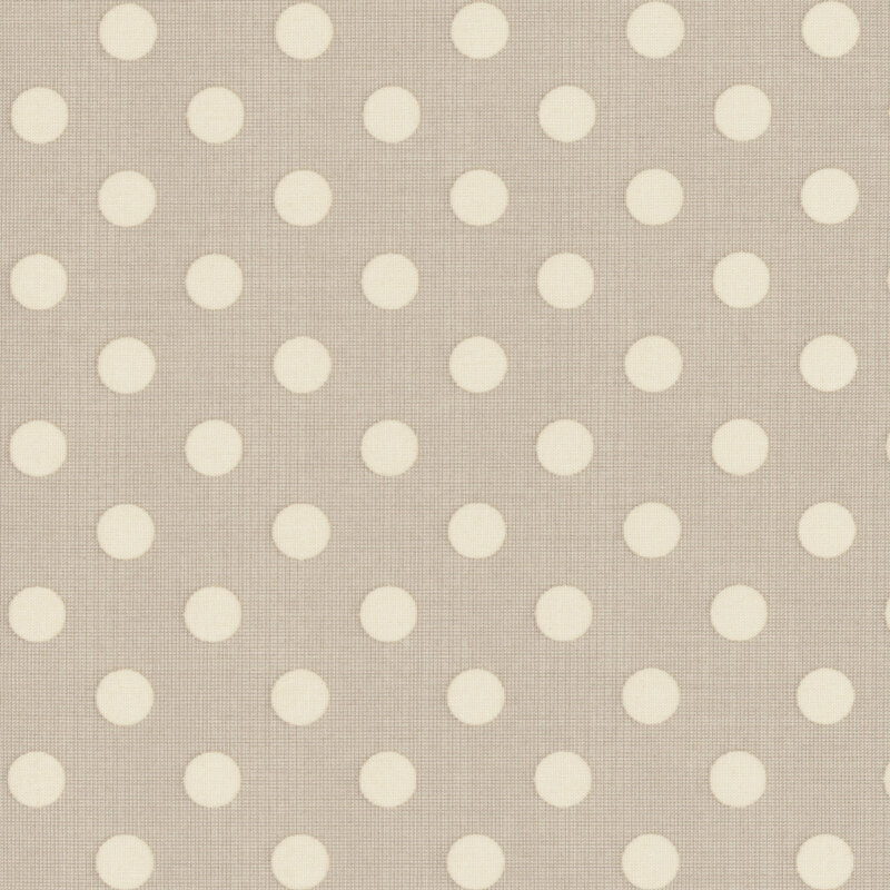 Light beige polka dots evenly spaced on a taupe fabric.