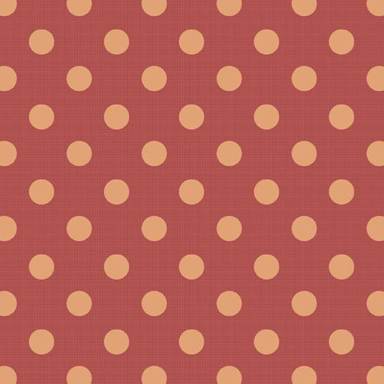 A fabric featuring a repeating pattern of cream-colored dots on a rust-colored surface.