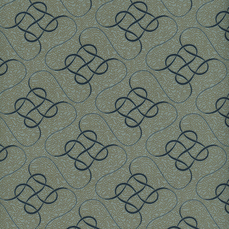 Blue fabric with an intricate, intertwined design on a dotted background.