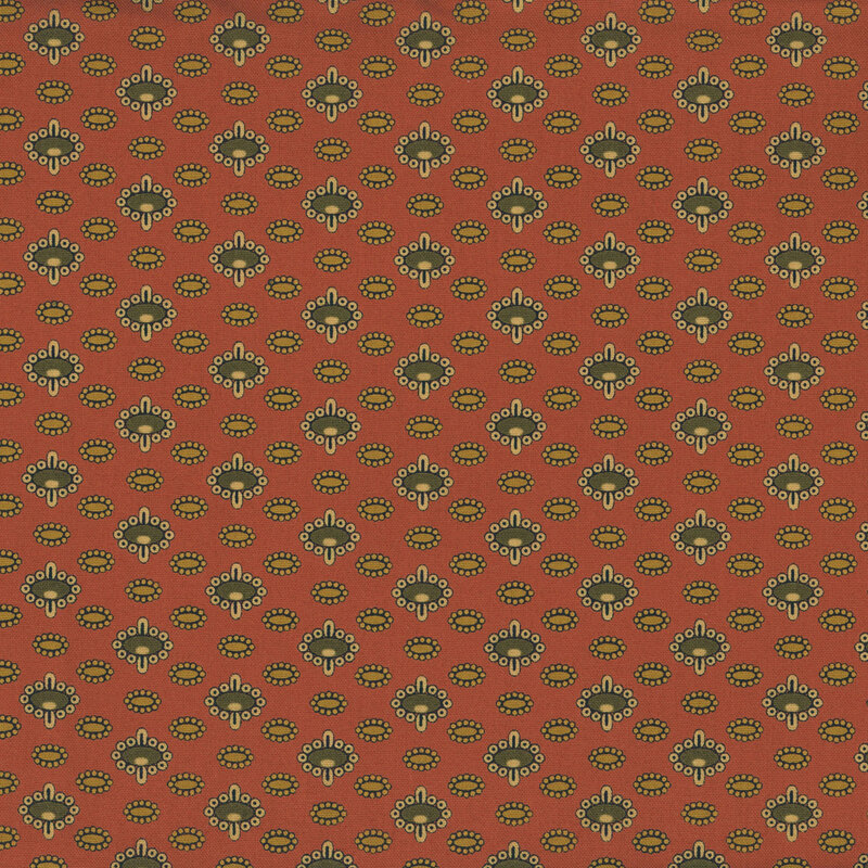 Burnt orange fabric with columns of abstract shapes.