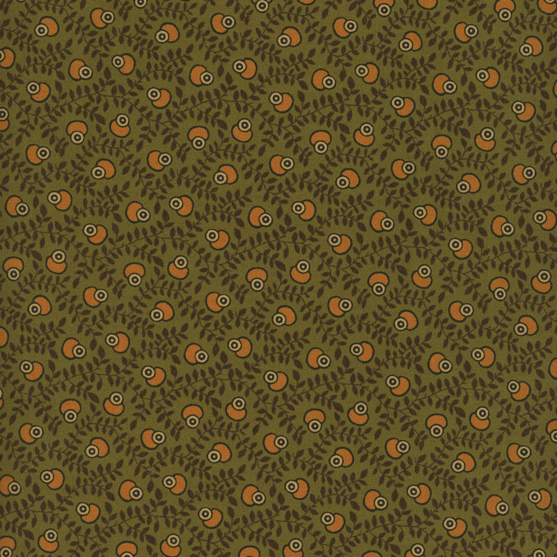 Green fabric with tossed abstract oval shapes on a background of sprawling vines.