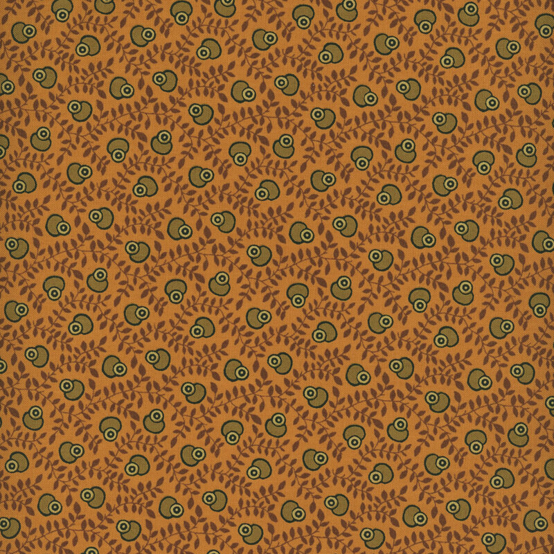 Dark gold fabric with tossed abstract oval shapes on a background of sprawling vines.