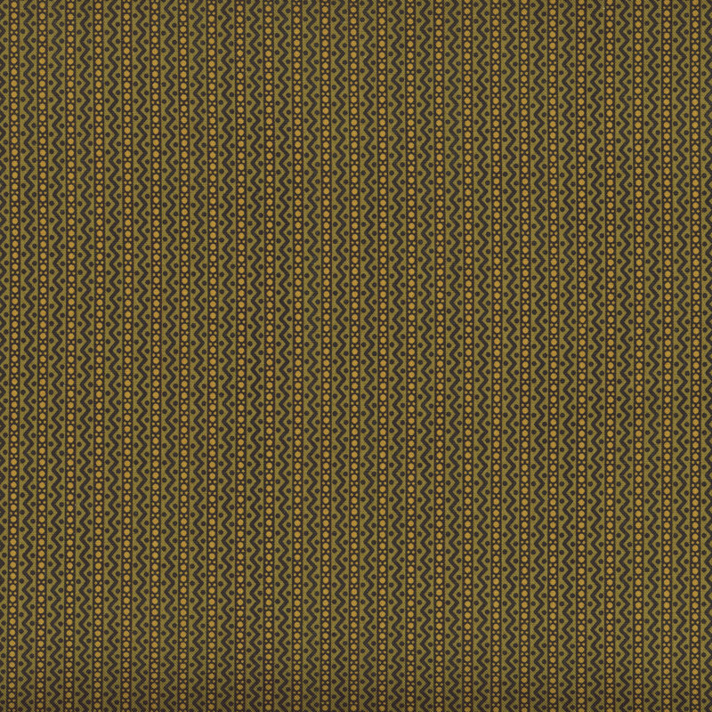 Green fabric with dotted stripes and zigzag stripes interspersed between.