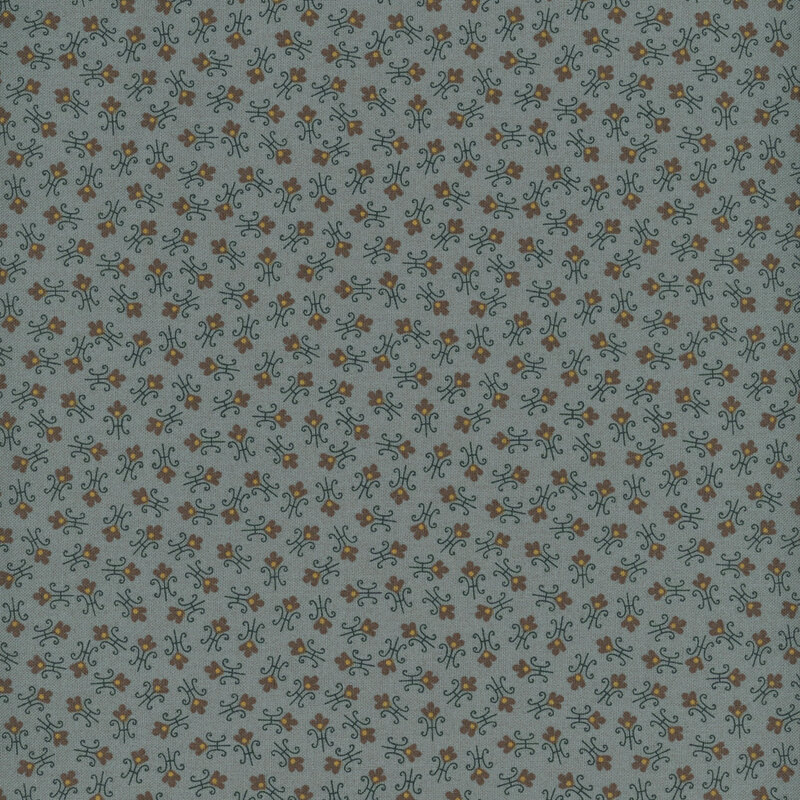 Blue fabric with tossed abstract floral shapes.