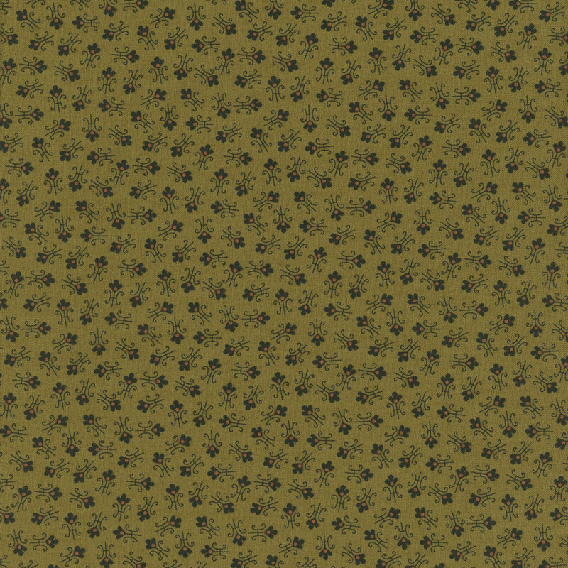 Green fabric with tossed abstract floral shapes.